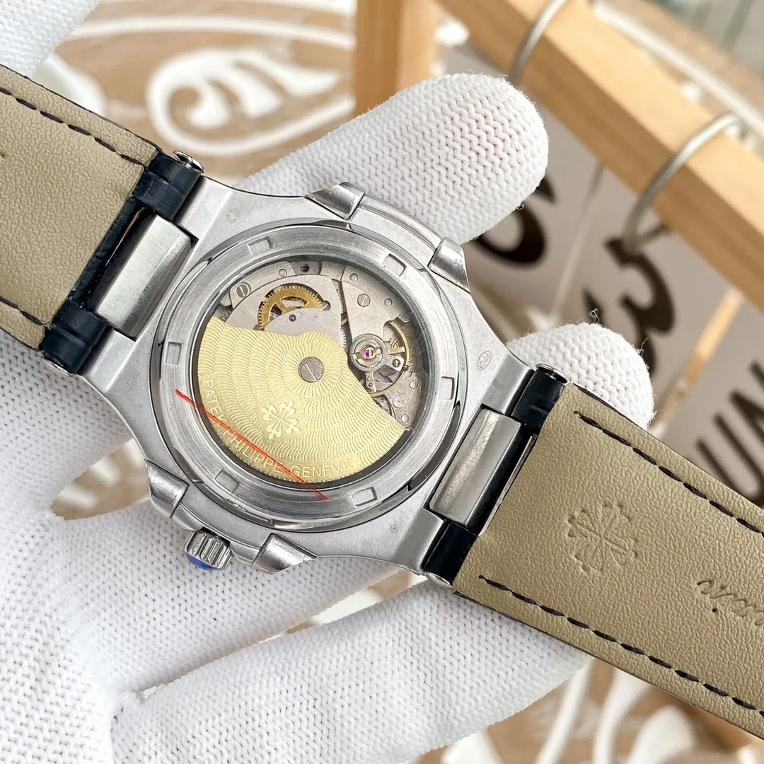 【Foreign trade import】💰1360! Real shot of Patek Philippe's "Nautilus" high-explosive version with zero modifications 🎈 [Movement] Matched with the brand new 2813 movement 0️⃣Reworked [Case] 316L fine steel case CNC process restores the original shell shape and curvature one to one, pursuing the original 0️⃣ gap [Bracelet] Using 316 fine steel custom-grade ergonomic bracelet [Dial] Adhering to the fineness of the big manufacturers, we strictly pursue the gap between the text lines, the thickness of the scales, and the luminous color, and strive to synchronize the 0️⃣ gap with the genuine products 🔥Top-level products, continuous high-quality products🔥